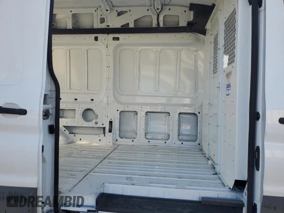 ✅ 2023 Ford Transit Cargo • VIN: 1FTBR3X80PKB02196 • Lot: 85529414. Listed on Copart with 89,528 mi. Free auction sales archive from the USA and detailed vehicle history report at DreamBid. Image 12.