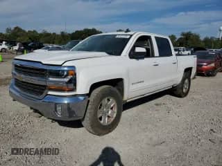 2017 Chevrolet Silverado 1500 LT с VIN 3GCUKREC6HG267699, выставлен на аукционе Copart как лот 84427225 с пробегом 196 592 миль миль и Чистый • Clean title. История ставок и продаж доступна на DreamBid. Изображение 1.