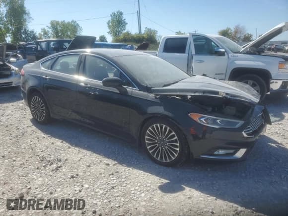 ✅ 2017 Ford Fusion Titanium • VIN: 3FA6P0D97HR251517 • Лот: 81607965. Опубликован ранее на Copart с пробегом 146 369 миль. Бесплатный доступ к архиву аукционных продаж из США и подробный отчёт об истории автомобиля на DreamBid. Изображение 4.
