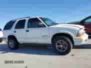 2004 Chevrolet Blazer LS with VIN 1GNDT13X74K146131, listed as a Copart auction lot 84865404 with Not provided miles and Clean title. Bid and sale history available at DreamBid. Image 4.