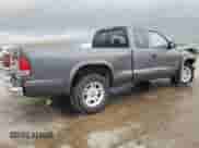 2003 Dodge Dakota SLT с VIN 1D7HL42X73S247297, выставлен на аукционе Copart как лот 80992814 с пробегом Не указан миль и Списание • Salvage title. История ставок и продаж доступна на DreamBid. Изображение 3.