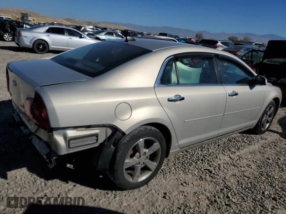 ✅ 2012 Chevrolet Malibu 1LT • VIN: 1G1ZC5E09CF214788 • Lot: 77371204. Listed on Copart with 143,302 mi. Free auction sales archive from the USA and detailed vehicle history report at DreamBid. Image 3.