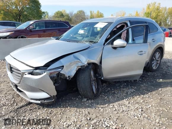 ✅ 2021 Mazda CX-9 Grand Touring • VIN: JM3TCADY6M0517827 • Lot: 43436121. Wystawiony na IAAI z przebiegiem 149 538 mil. Bezpłatny archiwum sprzedaży aukcyjnych z USA i szczegółowy raport historii pojazdu na DreamBid. Zdjęcie 2.