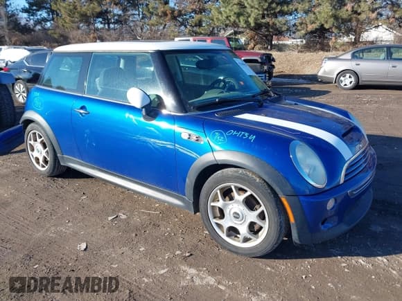 ✅ 2005 MINI Hardtop S • VIN: WMWRE33465TD95588 • Lot: 41440652. Listed on IAAI with 121,363 mi. Free auction sales archive from the USA and detailed vehicle history report at DreamBid. Image 1.