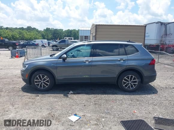 ✅ 2021 Volkswagen Tiguan S • VIN: 3VV1B7AX5MM148491 • Lot: 42561437. Listed on IAAI with 54,084 mi. Free auction sales archive from the USA and detailed vehicle history report at DreamBid. Image 14.