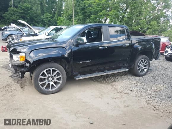 ✅ 2022 GMC Canyon 4WD Denali • VIN: 1GTG6EEN1N1218416 • Лот: 63737725. Опубликован ранее на Copart с пробегом 21 899 миль. Бесплатный доступ к архиву аукционных продаж из США и подробный отчёт об истории автомобиля на DreamBid. Изображение 1.