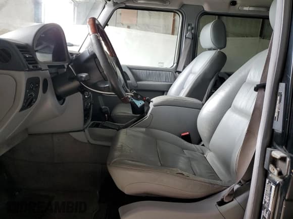 ✅ 2003 Mercedes-Benz G 500 • VIN: WDCYR49E13X142197 • Лот: 54010705. Опубликован ранее на Copart с пробегом 184 314 миль. Бесплатный доступ к архиву аукционных продаж из США и подробный отчёт об истории автомобиля на DreamBid. Изображение 7.