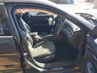 2015 Chevrolet Malibu LT z VIN 1G11C5SL6FF338694, wystawiony jako IAAI lot #43414226 z przebiegiem 107 248 mil mil oraz . Historia ofert i sprzedaży dostępna na DreamBid. Obrazek 5.