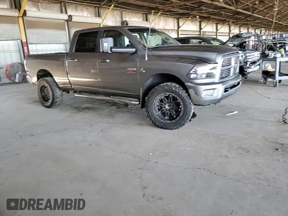 ✅ 2011 Ram 2500 Laramie Longhorn • VIN: 3D7UT2CL6BG547921 • Лот: 86296715. Опубликован ранее на Copart с пробегом 210 040 миль. Бесплатный доступ к архиву аукционных продаж из США и подробный отчёт об истории автомобиля на DreamBid. Изображение 13.