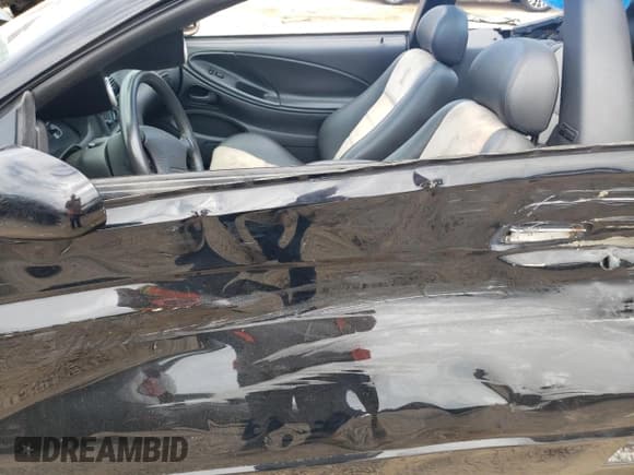 ✅ 2003 Ford Mustang SVT Cobra • VIN: 1FAFP49Y63F309534 • Лот: 69459154. Опубликован ранее на Copart с пробегом 100 372 миль. Бесплатный доступ к архиву аукционных продаж из США и подробный отчёт об истории автомобиля на DreamBid. Изображение 7.