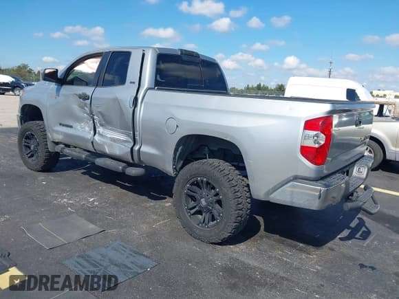 ✅ 2014 Toyota Tundra SR5 • VIN: 5TFRM5F18EX073513 • Lot: 43738760. Listed on IAAI with 92,586 mi. Free auction sales archive from the USA and detailed vehicle history report at DreamBid. Image 3.