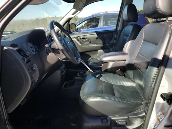 ✅ 2003 Ford Escape Limited • VIN: 1FMCU94123KA51772 • Lot: 83006044. Wystawiony na Copart z przebiegiem 89 132 mil. Bezpłatny archiwum sprzedaży aukcyjnych z USA i szczegółowy raport historii pojazdu na DreamBid. Zdjęcie 7.