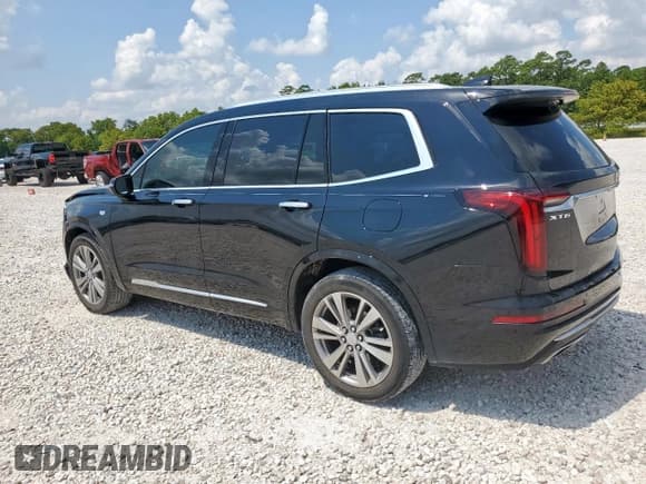 ✅ 2023 Cadillac XT6 FWD Premium Luxury • VIN: 1GYKPCRS0PZ184317 • Lot: 68299085. Wystawiony na Copart z przebiegiem 67 931 mil. Bezpłatny archiwum sprzedaży aukcyjnych z USA i szczegółowy raport historii pojazdu na DreamBid. Zdjęcie 2.