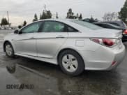 ✅ 2012 Hyundai Sonata Hybrid • VIN: KMHEC4A40CA030499 • Lot: 59590825. Listed on Copart with 125,184 mi. Free auction sales archive from the USA and detailed vehicle history report at DreamBid. Image 2.