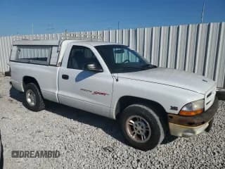 ✅ 1997 Dodge Dakota • VIN: 1B7FL26X1VS289323 • Lot: 70748184. Wystawiony na Copart z przebiegiem 141 671 mil. Bezpłatny archiwum sprzedaży aukcyjnych z USA i szczegółowy raport historii pojazdu na DreamBid. Zdjęcie 4.