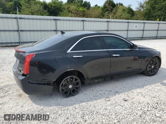 ✅ 2014 Cadillac ATS Standard AWD • VIN: 1G6AG5RX4E0145579 • Лот: 72071655. Опубликован ранее на Copart с пробегом Не указан. Бесплатный доступ к архиву аукционных продаж из США и подробный отчёт об истории автомобиля на DreamBid. Изображение 3.