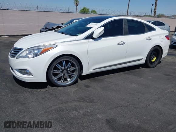 ✅ 2014 Hyundai Azera Limited • VIN: KMHFH4JG2EA333397 • Лот: 42610633. Опубликован ранее на IAAI с пробегом 128 952 миль. Бесплатный доступ к архиву аукционных продаж из США и подробный отчёт об истории автомобиля на DreamBid. Изображение 2.