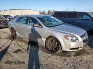 ✅ 2012 Chevrolet Malibu 1LS • VIN: 1G1ZB5E09CF357419 • Lot: 75650164. Listed on Copart with 150,496 mi. Free auction sales archive from the USA and detailed vehicle history report at DreamBid. Image 4.