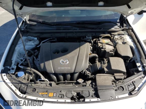 ✅ 2021 Mazda 3 S • VIN: JM1BPAAL8M1331668 • Lot: 82009625. Listed on Copart with 87,747 mi. Free auction sales archive from the USA and detailed vehicle history report at DreamBid. Image 11.