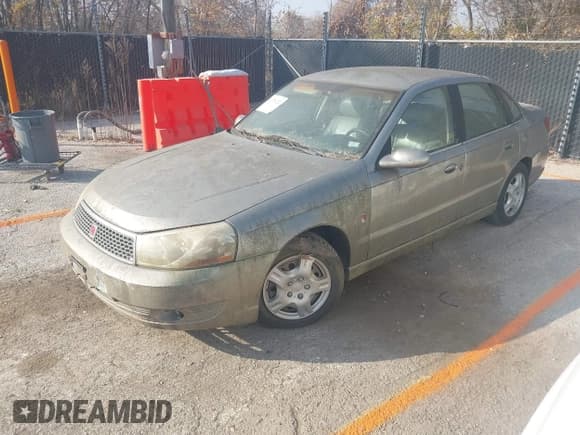 ✅ 2003 Saturn LS • VIN: 1G8JU54FX3Y556207 • Lot: 43731223. Listed on IAAI with 129,019 mi. Free auction sales archive from the USA and detailed vehicle history report at DreamBid. Image 2.