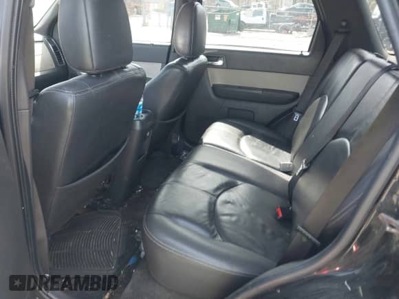 2009 Mercury Mariner Premier with VIN 4M2CU97799KJ04510, listed as a IAAI auction lot 41943965 with 190,929 mi miles and . Bid and sale history available at DreamBid. Image 8.