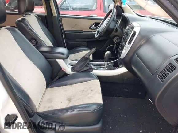 2005 Mercury Mariner Luxury z VIN 4M2YU56185DJ17484, wystawiony jako IAAI lot #42364348 z przebiegiem 199 262 mil mil oraz . Historia ofert i sprzedaży dostępna na DreamBid. Obrazek 5.