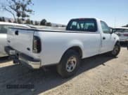 ✅ 1999 Ford F-150 XL • VIN: 1FTRF17L3XKA66147 • Lot: 69105514. Wystawiony na Copart z przebiegiem 179 426 mil. Bezpłatny archiwum sprzedaży aukcyjnych z USA i szczegółowy raport historii pojazdu na DreamBid. Zdjęcie 3.