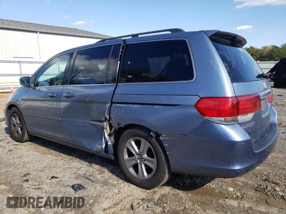 ✅ 2009 Honda Odyssey Touring • VIN: 5FNRL38909B011789 • Лот: 91068205. Опубликован ранее на Copart с пробегом 232 333 миль. Бесплатный доступ к архиву аукционных продаж из США и подробный отчёт об истории автомобиля на DreamBid. Изображение 2.