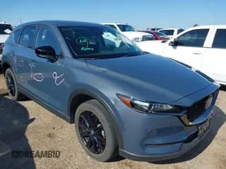 ✅ 2021 Mazda CX-5 Touring • VIN: JM3KFACM9M0424799 • Lot: 42691378. Listed on IAAI with 24,613 mi. Free auction sales archive from the USA and detailed vehicle history report at DreamBid. Image 1.