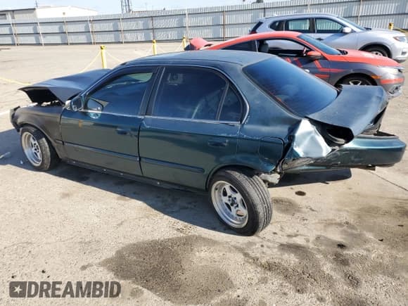 ✅ 1998 Honda Civic EX • VIN: 2HGEJ8549WH602267 • Lot: 87268494. Listed on Copart with 219,779 mi. Free auction sales archive from the USA and detailed vehicle history report at DreamBid. Image 2.