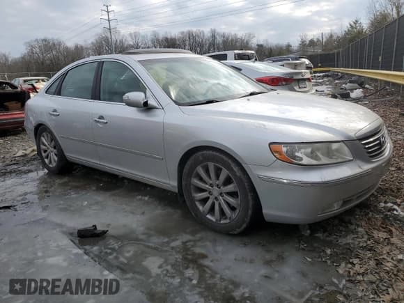 ✅ 2009 Hyundai Azera Limited • VIN: KMHFC46F99A343316 • Lot: 47958075. Listed on Copart with 163,668 mi. Free auction sales archive from the USA and detailed vehicle history report at DreamBid. Image 4.