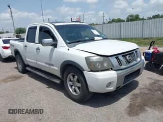 ✅ 2012 Nissan Titan SL • VIN: 1N6BA0EC1CN326919 • Lot: 42630368. Listed on IAAI with 230,215 mi. Free auction sales archive from the USA and detailed vehicle history report at DreamBid. Image 1.
