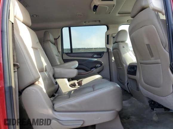 ✅ 2015 Chevrolet Suburban LTZ • VIN: 1GNSCKKC0FR552631 • Lot: 82157695. Wystawiony na Copart z przebiegiem 173 238 mil. Bezpłatny archiwum sprzedaży aukcyjnych z USA i szczegółowy raport historii pojazdu na DreamBid. Zdjęcie 11.