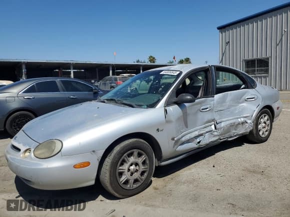 ✅ 1997 Ford Taurus GL • VIN: 1FALP5228VG222228 • Lot: 64806845. Listed on Copart with 160,397 mi. Free auction sales archive from the USA and detailed vehicle history report at DreamBid. Image 1.