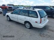 ✅ 1997 Ford Escort • VIN: 1FALP15P2VW111826 • Lot: 42695919. Listed on IAAI with 80,911 mi. Free auction sales archive from the USA and detailed vehicle history report at DreamBid. Image 3.