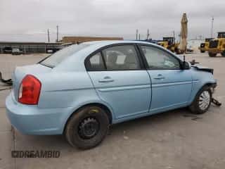 2010 Hyundai Accent GLS z VIN KMHCN4AC7AU411657, wystawiony jako Copart lot #72576574 z przebiegiem 151 568 mil mil oraz Szkoda całkowita • Salvage title. Historia ofert i sprzedaży dostępna na DreamBid. Obrazek 3.