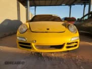 ✅ 2005 Porsche 911 Carrera 997 • VIN: WP0AA29935S715591 • Lot: 80885594. Wystawiony na Copart z przebiegiem 125 878 mil. Bezpłatny archiwum sprzedaży aukcyjnych z USA i szczegółowy raport historii pojazdu na DreamBid. Zdjęcie 5.