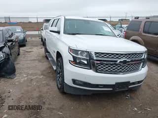 2017 Chevrolet Suburban LT z VIN 1GNSCHKC3HR333409, wystawiony jako IAAI lot #42201558 z przebiegiem 130 394 mil mil oraz . Historia ofert i sprzedaży dostępna na DreamBid. Obrazek 1.