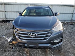 ✅ 2017 Hyundai Santa Fe Ultimate • VIN: 5XYZWDLA7HG483753 • Лот: 40912203. Опубликован ранее на Copart с пробегом 74 356 миль. Бесплатный доступ к архиву аукционных продаж из США и подробный отчёт об истории автомобиля на DreamBid. Изображение 5.