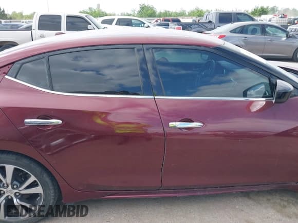 ✅ 2017 Nissan Maxima S • VIN: 1N4AA6AP7HC449112 • Lot: 42024070. Listed on IAAI with 121,988 mi. Free auction sales archive from the USA and detailed vehicle history report at DreamBid. Image 13.