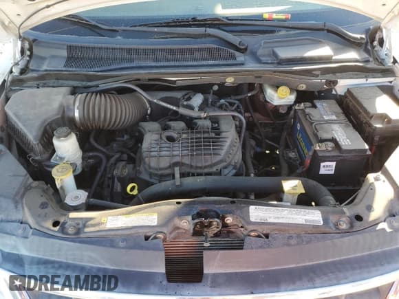 ✅ 2012 Volkswagen Routan SE • VIN: 2C4RVABG3CR392541 • Lot: 85396885. Listed on Copart with 108,277 mi. Free auction sales archive from the USA and detailed vehicle history report at DreamBid. Image 12.