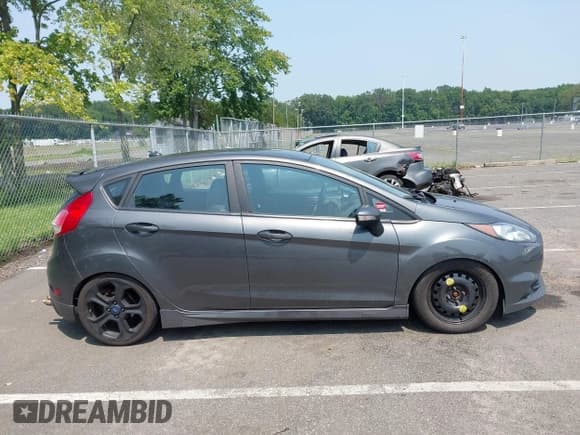 ✅ 2016 Ford Fiesta ST • VIN: 3FADP4GX1GM135220 • Лот: 42900289. Опубликован ранее на IAAI с пробегом 166 743 миль. Бесплатный доступ к архиву аукционных продаж из США и подробный отчёт об истории автомобиля на DreamBid. Изображение 14.