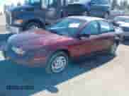 2002 Saturn SL z VIN 1G8ZF52852Z267004, wystawiony jako IAAI lot #41760974 z przebiegiem 228 165 mil mil oraz . Historia ofert i sprzedaży dostępna na DreamBid. Obrazek 2.