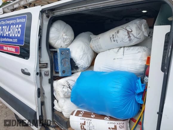 ✅ 2020 Ford Transit Cargo • VIN: 1FTBR1Y86LKA05064 • Lot: 43382385. Listed on IAAI with 209,307 mi. Free auction sales archive from the USA and detailed vehicle history report at DreamBid. Image 8.