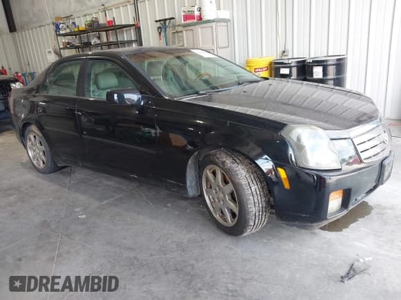 ✅ 2003 Cadillac CTS • VIN: 1G6DM57N430154755 • Lot: 42467586. Wystawiony na IAAI z przebiegiem 211 439 mil. Bezpłatny archiwum sprzedaży aukcyjnych z USA i szczegółowy raport historii pojazdu na DreamBid. Zdjęcie 1.