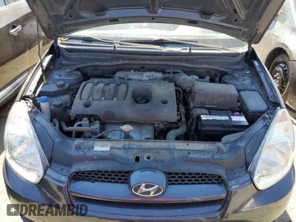 2010 Hyundai Accent GS z VIN KMHCM3AC2AU163024, wystawiony jako Copart lot #62352714 z przebiegiem 84 946 mil mil oraz Szkoda całkowita • Salvage title. Historia ofert i sprzedaży dostępna na DreamBid. Obrazek 11.