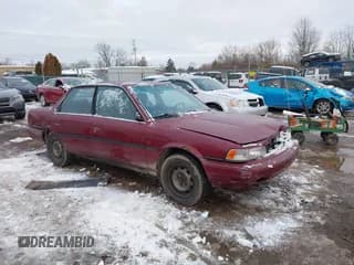 ✅ 1991 Toyota Camry DLX • VIN: 4T1SV21EXMU405194 • Лот: 43844168. Опубликован ранее на IAAI с пробегом 182 709 миль. Бесплатный доступ к архиву аукционных продаж из США и подробный отчёт об истории автомобиля на DreamBid. Изображение 1.