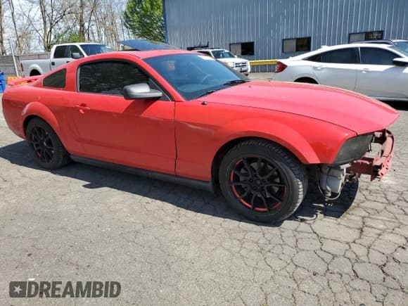 ✅ 2005 Ford Mustang Deluxe • VIN: 1ZVFT80N555129676 • Lot: 52985715. Listed on Copart with 135,160 mi. Free auction sales archive from the USA and detailed vehicle history report at DreamBid. Image 4.