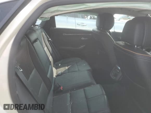 ✅ 2014 Chevrolet Impala LTZ • VIN: 1G1145SLXEU104632 • Lot: 70753384. Listed on Copart with 112,229 mi. Free auction sales archive from the USA and detailed vehicle history report at DreamBid. Image 10.