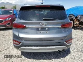 ✅ 2019 Hyundai Santa Fe SE • VIN: 5NMS2CAD6KH094703 • Lot: 55107543. Wystawiony na Copart z przebiegiem 85 031 mil. Bezpłatny archiwum sprzedaży aukcyjnych z USA i szczegółowy raport historii pojazdu na DreamBid. Zdjęcie 6.